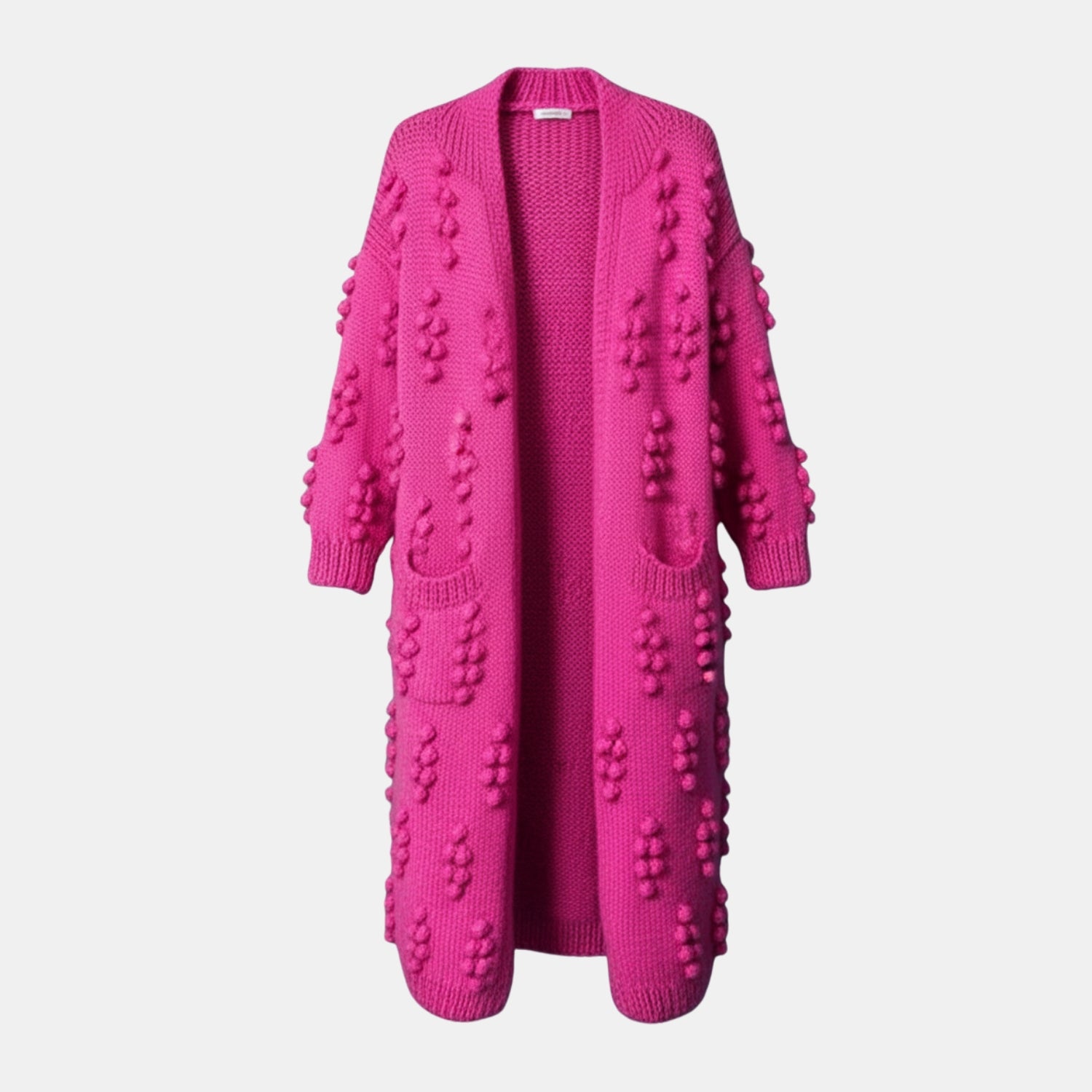 Lange Strickjacke für Damen mit Bommeln in Pink – warme Winter-Strickjacke Vorderansicht