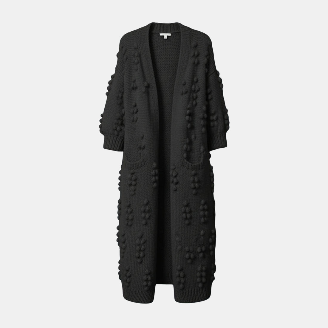 Rückseite der langen Strickjacke für Damen mit Bommeln in Schwarz – warme Winter-Strickjacke