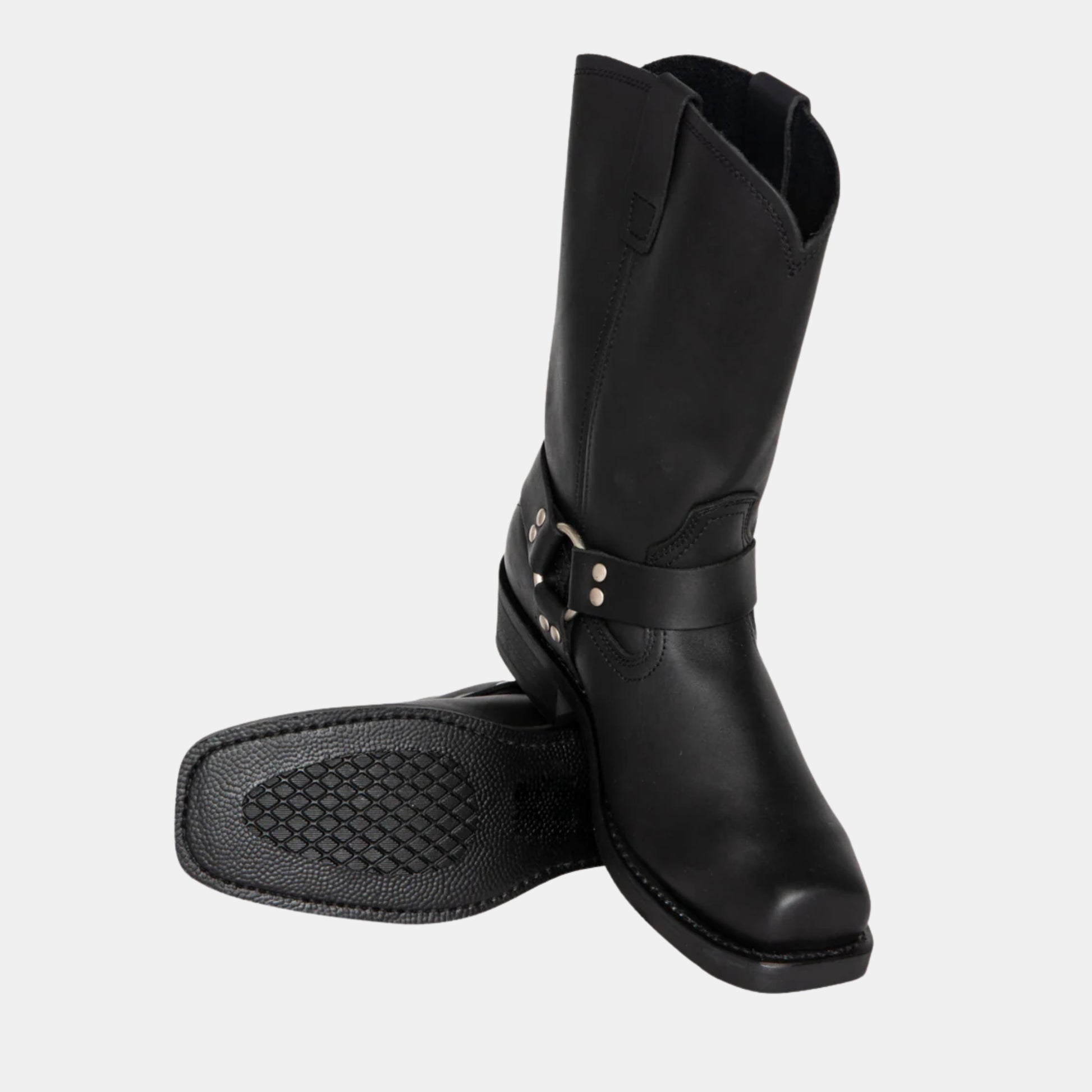 Cowboystiefel im Vintage-Look aus schwarzem Leder mit sichtbarer rutschfester Sohle und seitlicher Ansicht