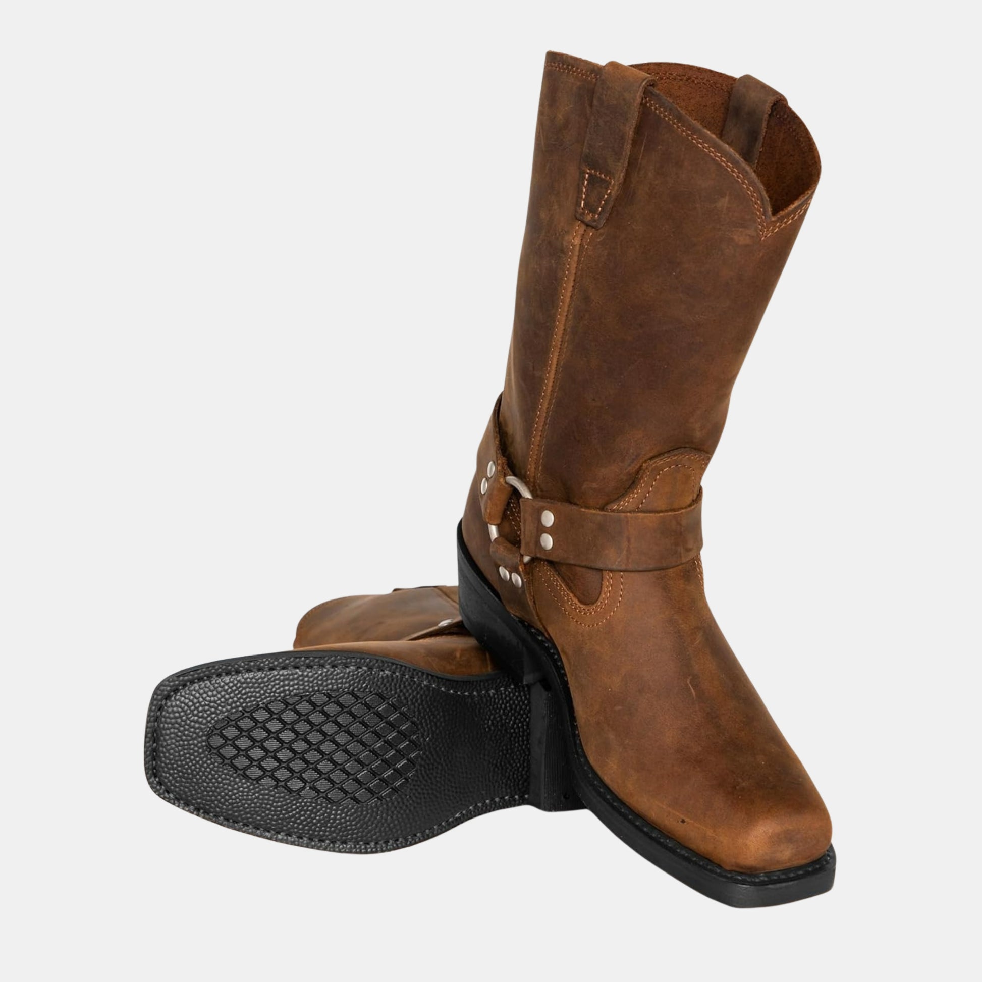 Cowboystiefel im Vintage-Look mit sichtbarer rutschfester Sohle und seitlicher Ansicht aus braunem Leder